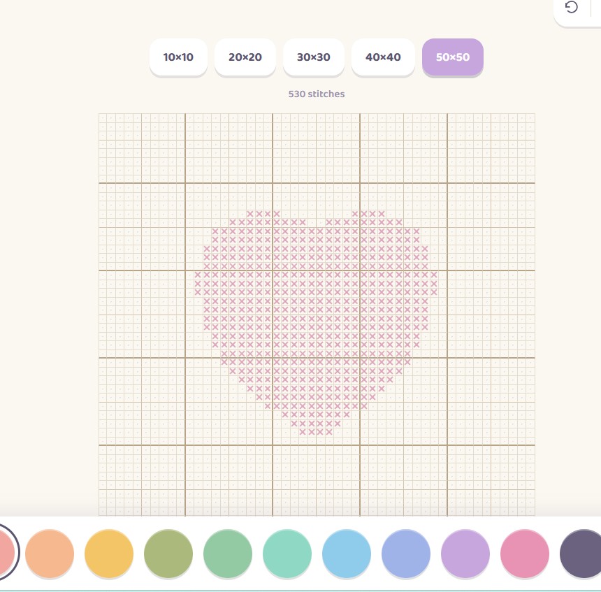 A screenshot of a kids cross-stitch designer