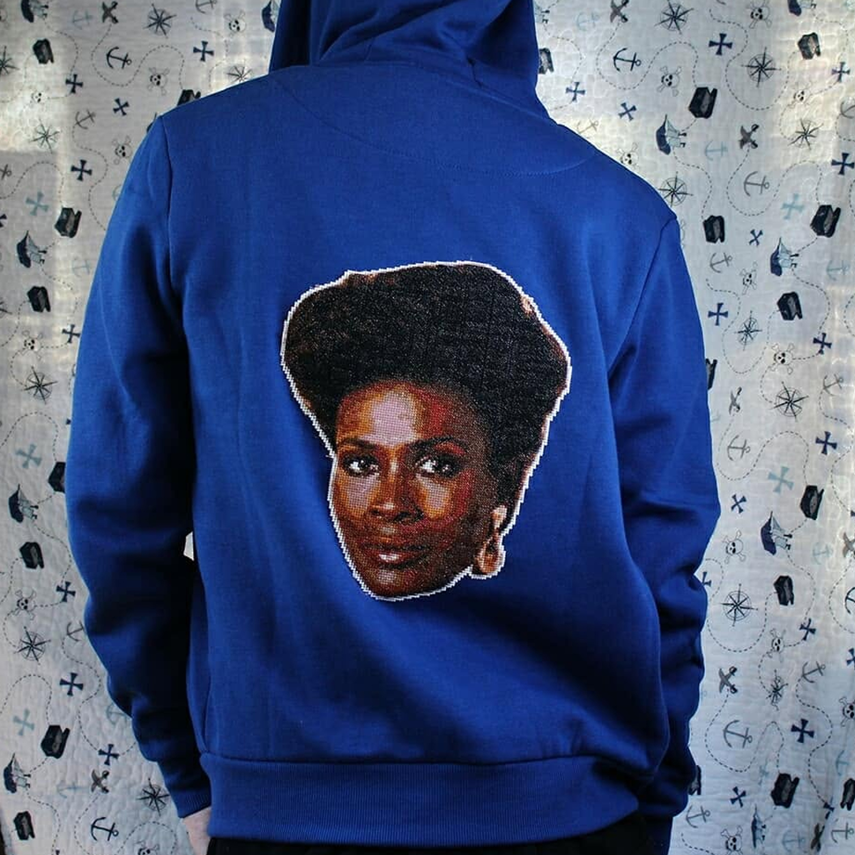 A cross-stitch of Aunt Viv, from the Fresh Prince of Bel Air, on a jumper.