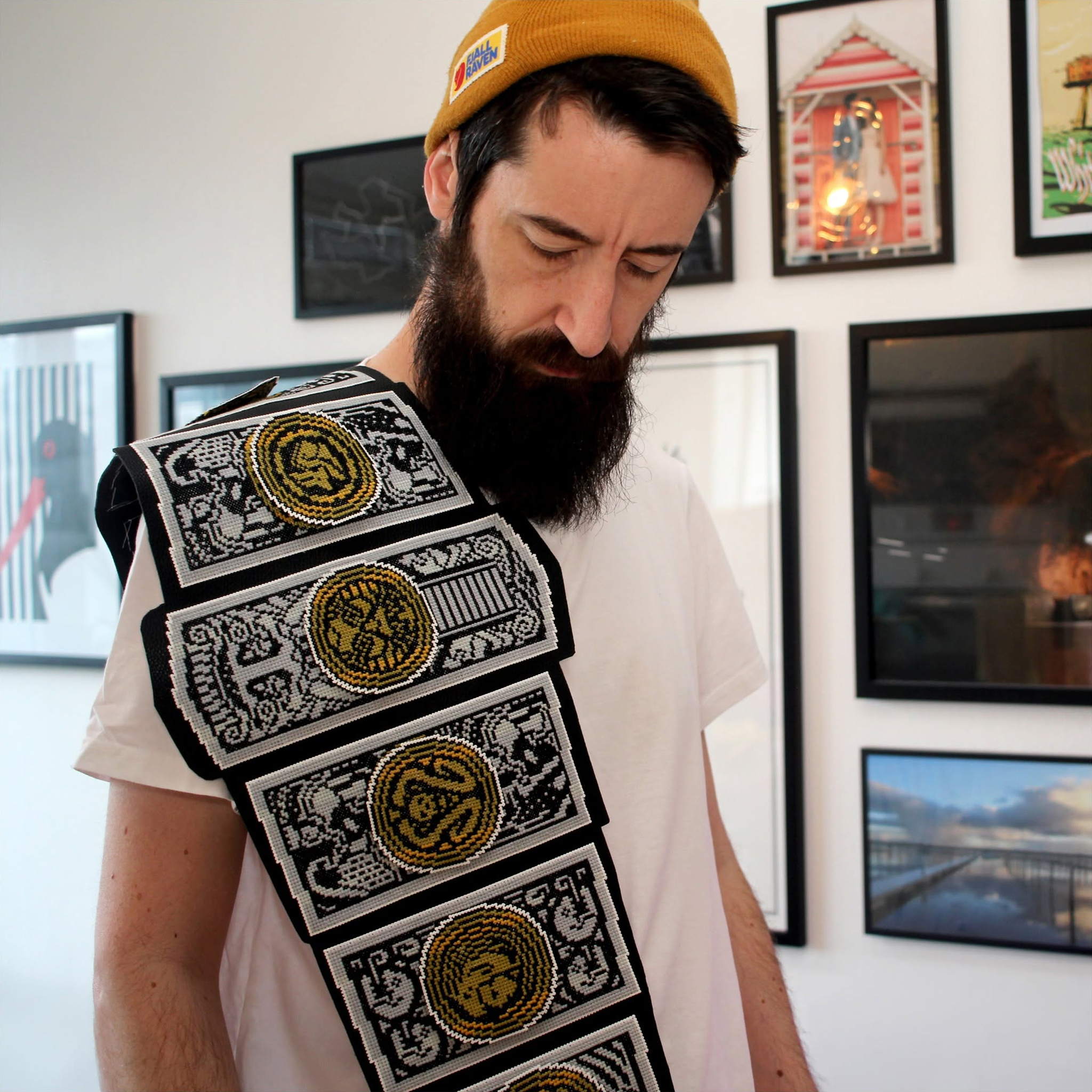 A cross-stitch of the Lucha Underground Gift of Gods Championship.