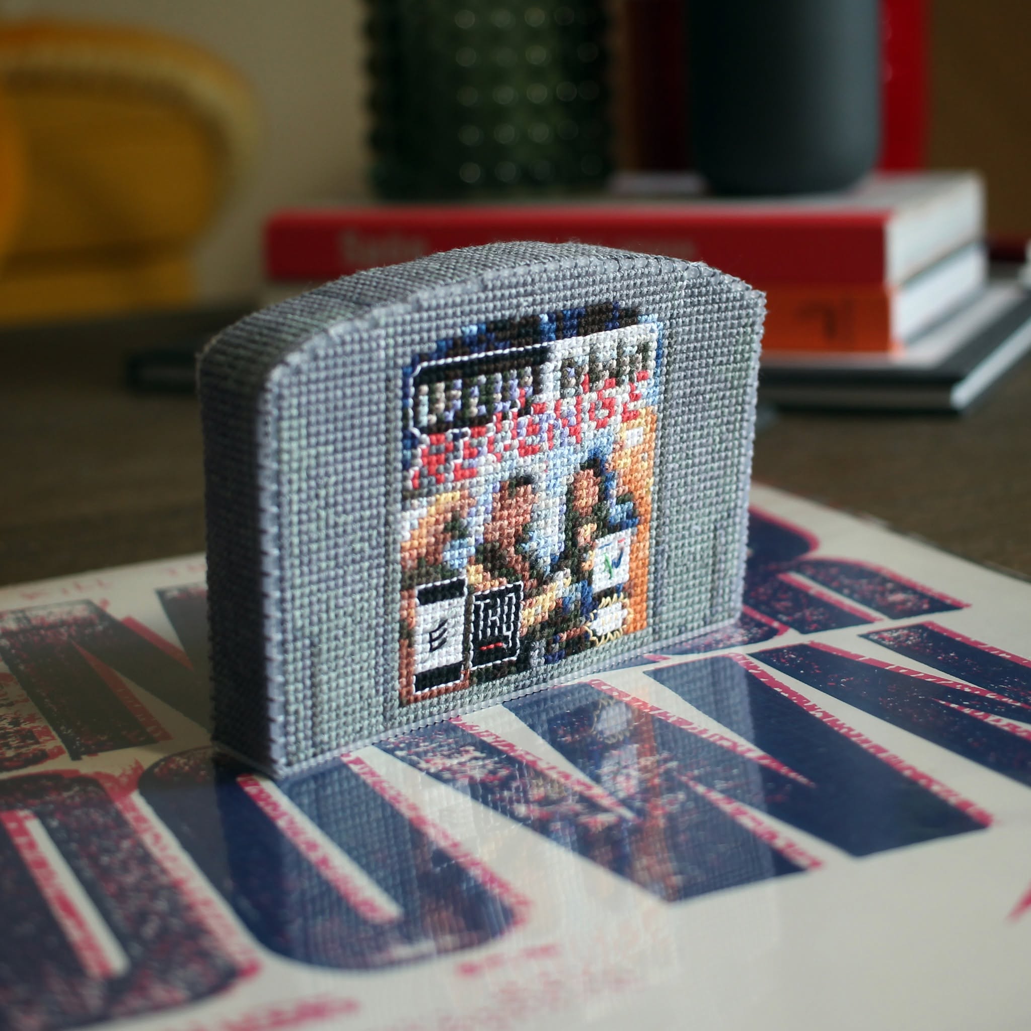 A 3D cross-stitched copy of the N64 game WCW/nWo Revenge.