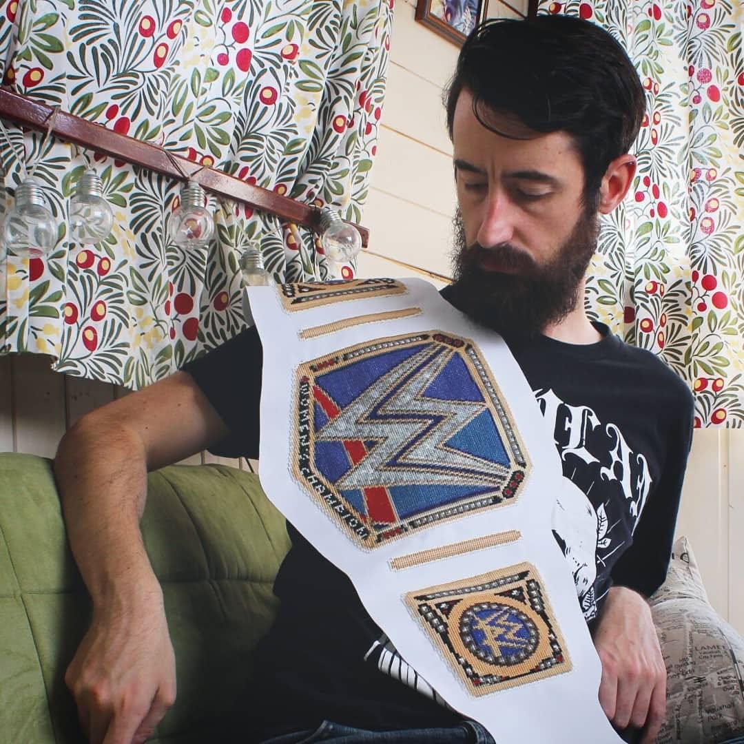 A cross-stitch of the WWE Women's Smackdown Championship.