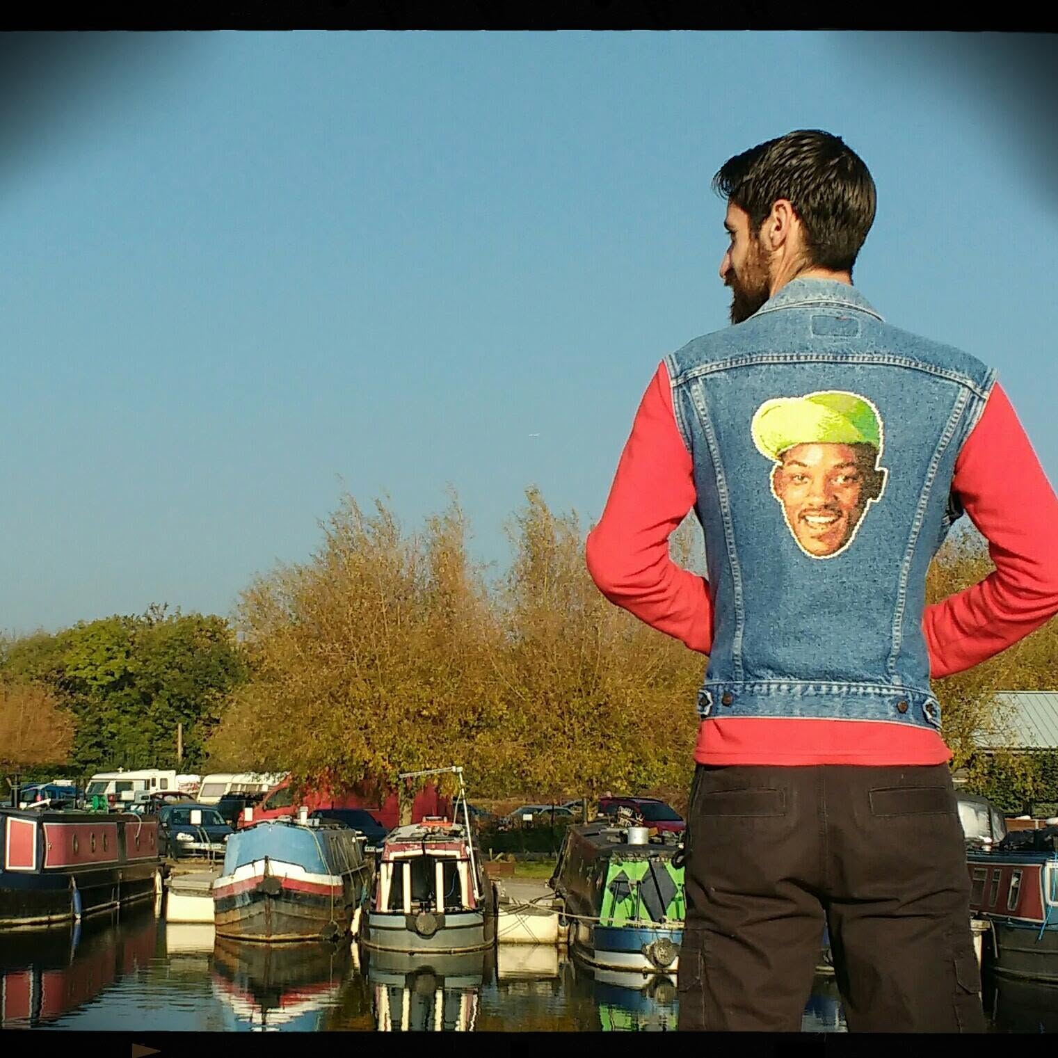 A cross-stitch of Will Smith, on a denim jacket.